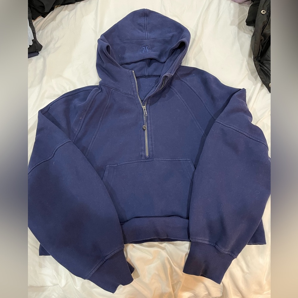 Lululemon navy blue scuba quarter zip, small stain.